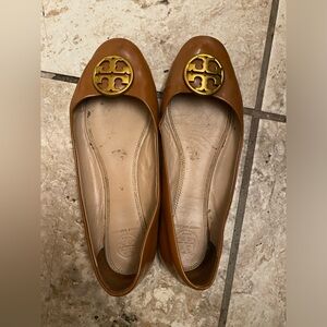 Well worn patent leather flats